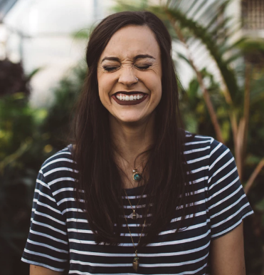 woman smiling with her teeth