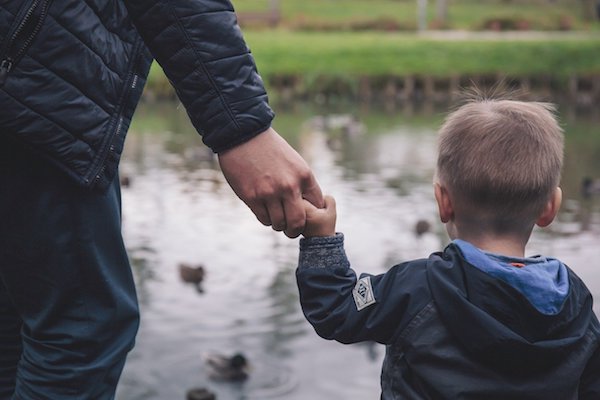 Father and son in park